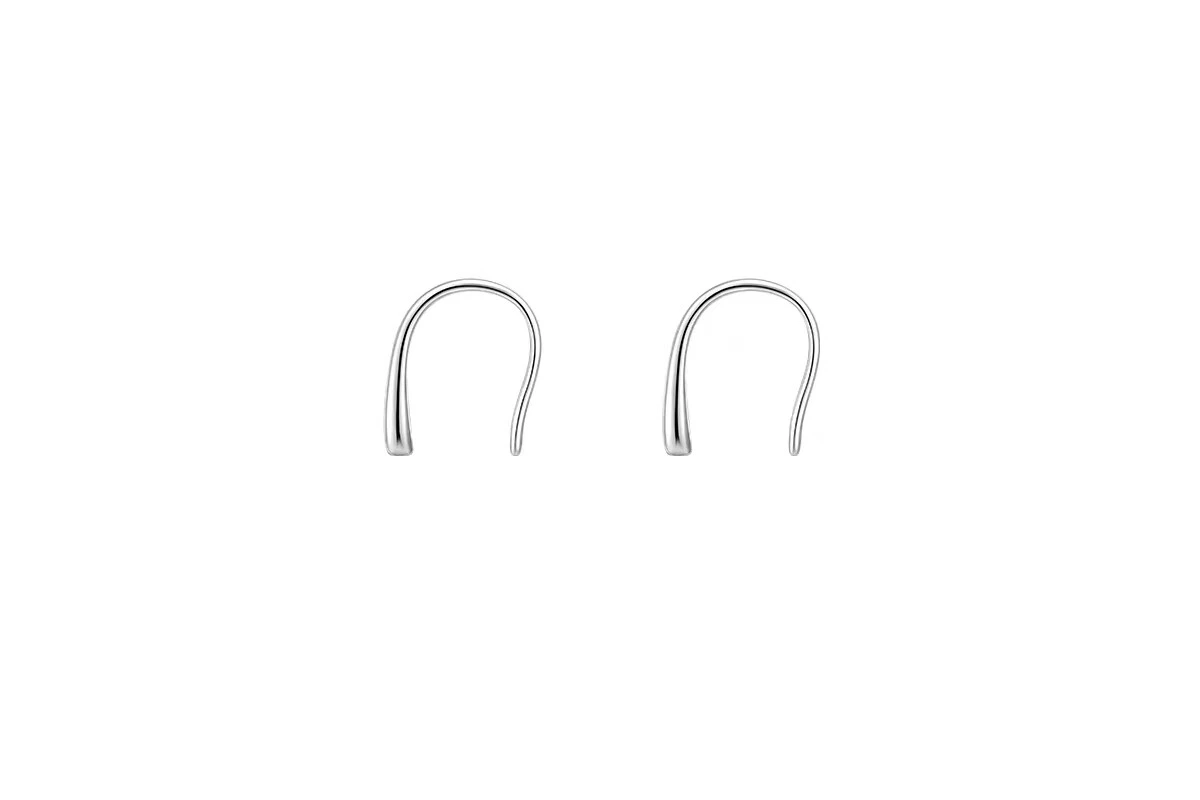 Side-by-side view of Bijoux Bar silver drop earrings showing the Klein bottle inspired continuous curve